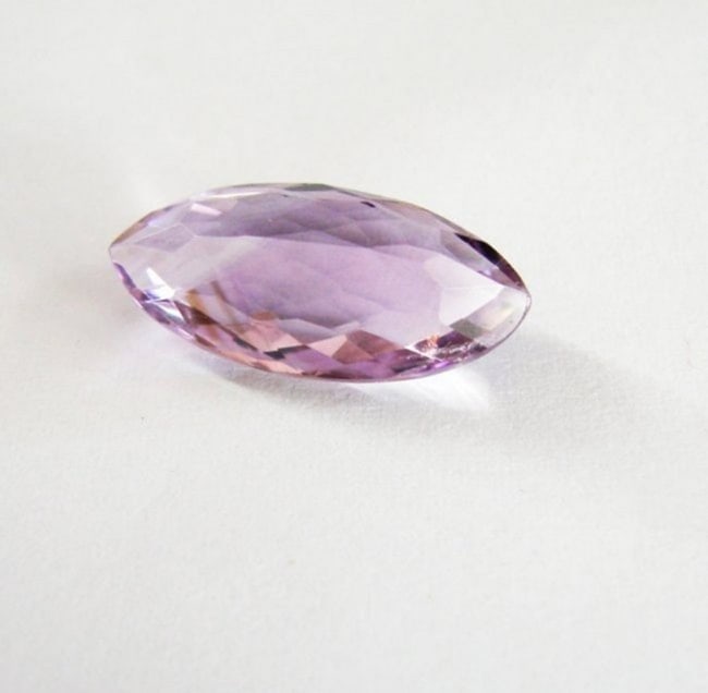Natural Pink Amethyst Marquis Checkerboard 7.83Ct: Gem: Natural Pink Amethyst Qty: 1 Weight: 7.83 Carat Marquis Shape Cut: Checkerboard Measurement: 19.9x9.4x7.3 mm Clarity: VVS, Color: Pink Treatment: None Origin: Brazil Estimate Value Prices $