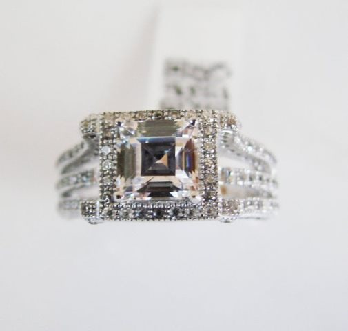 Creation Diamond-Ring 2.35Ct 18k W/g Overlay: This item was made by high quality handicrafts Gem Type: Creation Diamonds High Quality Item Total Weight:2.35 carat Center Emerald Cut: 1.50 This item was made by high quality handicrafts Gem Type: C