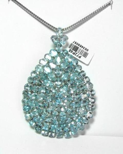 Blue Topaz Pendant 53.90Ct 18k W/g Overlay: Gems Type: Natural Blue Topaz Weight: 53.90 Carat (77 pieces, Size: 6x5mm) Item: Pendant or Brooch Clarity: Transparent Color: Sky Blue Shape/Cut: Oval Facet Treatment: None Origin: Brazil Har