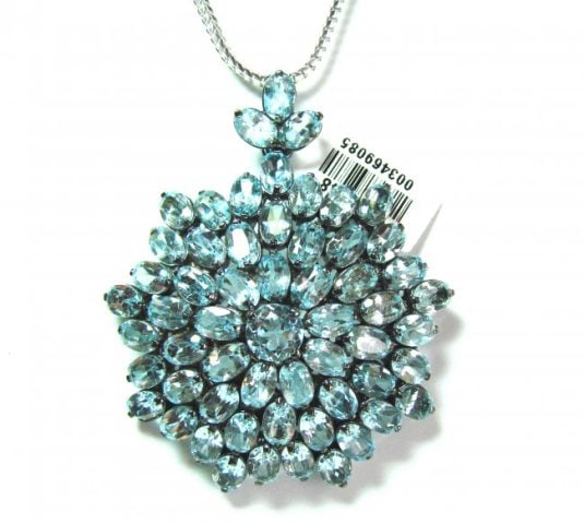 Blue Topaz Pendant 48.00Ct 18k B/g Overlay: Gems Type: Natural Beautiful Blue Topaz Stones High Quality Item Hand made by Handicraft Weight: 48.00 Carat (58 pieces, Size:7x5mm ) Item: Pendant or Brooch Clarity: VSI Color: Sky Blue Shape/Cut: Ov