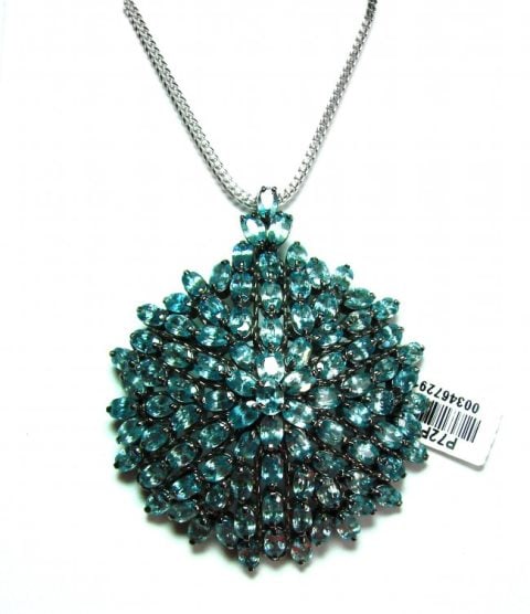 Natural Blue Zircon Pendant Brooch 40.52Ct 18k B/g Overlay 925 Silver: Gem type: Natural Blue Zircon Item: Pendant or Brooch Pin Blue Zircon: 5x4mm Weight: 40.52 Carat- Oval Shaped Clarity: Transparent, Color: Ocean Blue /Treatment: Heated) Shape: Oval Faceted Hardness: 