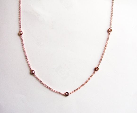 Creation, Diamond Pazel Chain .90Ct 18k R/g Overlay: Gem Type:Creation Diamonds High Quality 10 Pieces Round Brilliant Weight :.90 Carat: Clarity: VVS,Color: F Metal:18k Rose Gold Overlay 925 Silver Weight :2.21 gram, Chain: 17" Long Design: Pazel Setti