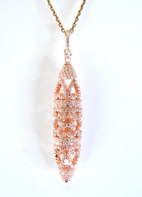 Creation Diamond Pendant Drop 3.20Ct 18k R/G Overlay: Creation Diamonds Pendant Drop High Quality Item Item: Pendant Weight: 3.20 carat Round brilliant Clarity: VVS, Color: F L2" x W1/2" Setting: Micro Pave 18k Rose gold overlay 925 silver Weight: 7.34 g