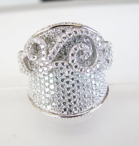 Creation Diamond Antique Ring 3.64Ct 18k W/G Overlay: Creation Diamonds Ring High Quality Item Item: Ring Weight: 3.64 carat Round brilliant Clarity: VVS, Color: F Face Ring:L3/4" x W3/4",Thickness:4-5 mm Setting: Micro Pave 18k White gold overlay 925 si