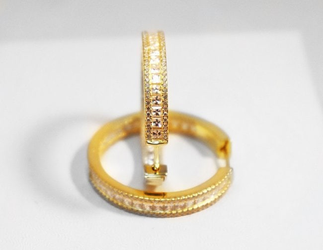 Creation Diamond Hoop Earrings 18k Y/G Overlay: Gem Type: Creation Diamond Item: Hoop Earrings, Size: 1.25 inches Diameter, Width: 4.5mm White Stone: 1.35 Carat round brilliant, Clarity: VS1, Color: G Princess Cut : 2.70 Carat, Clarity: Clarity: VS