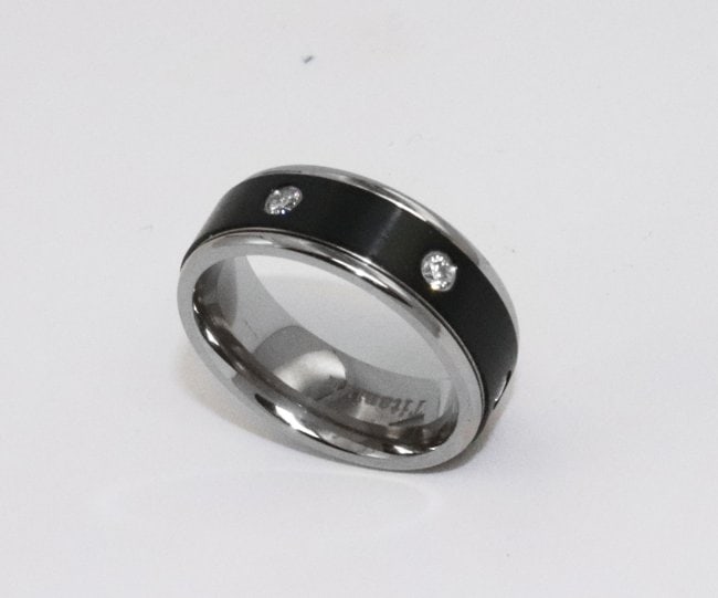 Man's Band Tungsten Ring Carbon Fiber Center: Information on Item Item: Eternity Band High Plashed Pipe Cut Ring With 6 White CZs on Black Carbon Fiber Center Stone Setting: Bezel-Set Width: 8mm, Size 9, Item: New