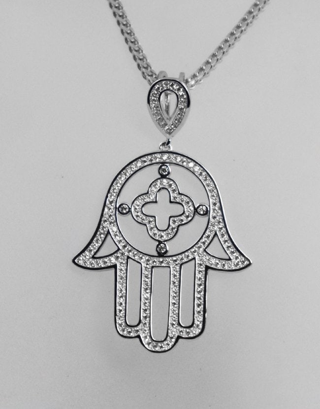 Hamsa Hand Pendan 18K W/G Overlay 925: Stone: Creation, White Diamond Stone Total: Approx. 1. Carat round brilliant Pendant: Hamsa Hand 2. Inches, Width: 1.40? Metal: 18k white gold over 925 silver (4.70 grams) (No chain including) This