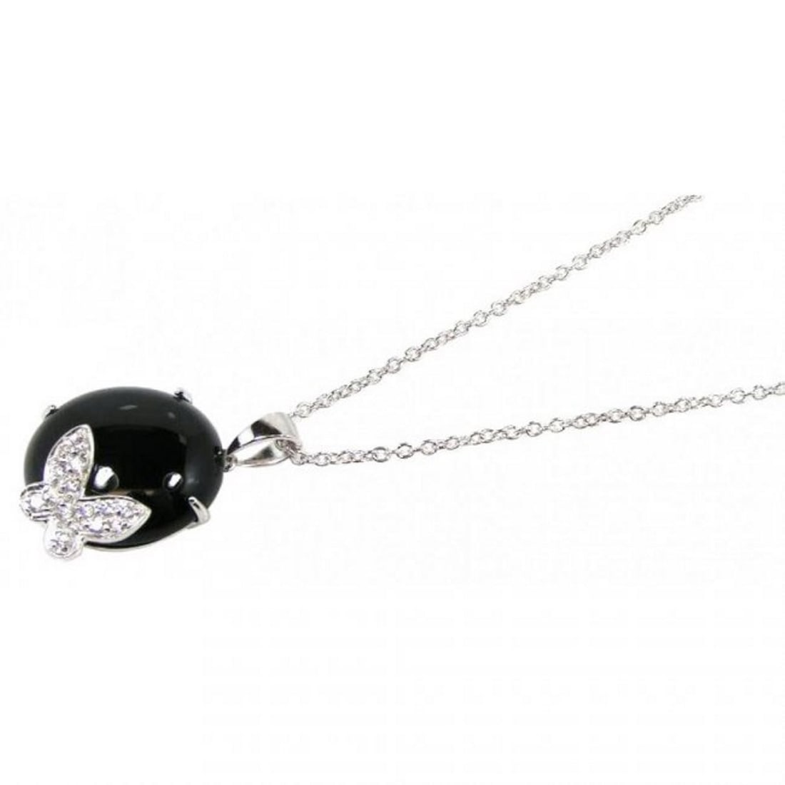 Creation, Diamond/Onyx 18k W/g Overlay 925: Gem Type: Creation, White Diamond/Natural Black Onyx White Stone: .20 Carat round brilliant, Clarity: VSI, Color: F Onyx size 18x18mm round Shaped/Cut: Round, Cabochon, and Luster: Excellent Metal: 18