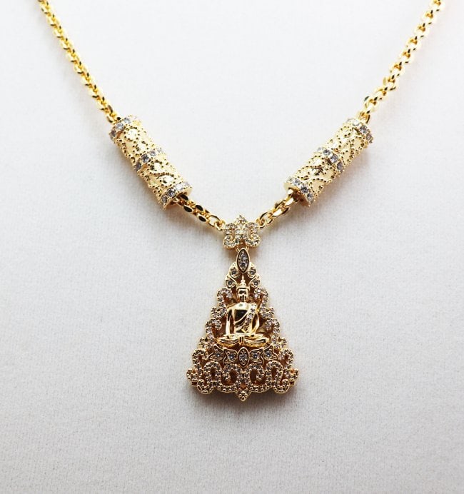 Buddha Necklace /2 Bars 18K Yellow Gold Over Brass: Item: Necklace Length: 18 Inches White Stone: Cubic Zirconia round brilliant Metal: 18k yellow gold overlay Brass Weight: 35 grams Chain Thickness: 3mm 2 Bar size: Width: 8mm, Length: 1. Inch Buddha