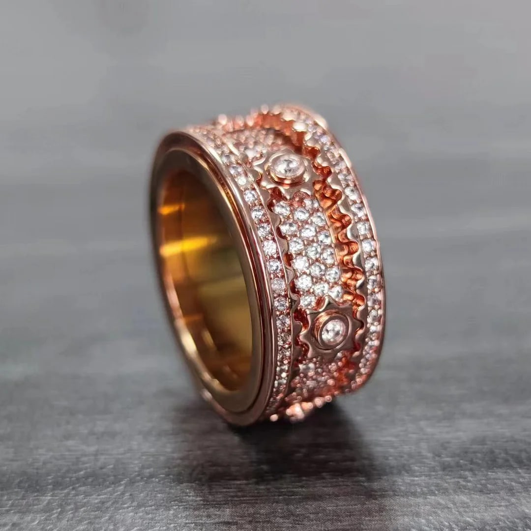 reation, Diamond Gear Eternity Ring 1.15 Carat Rose/g Overlay 925: Gem: Creation, Diamond Stone: 1.15 carat white brilliant round shaped Clarity: VVS1 Color: F Metal: 14k Rose gold overlay of 925, 11.63 grams Size: 7 Width: 11 mm Thickness: 2mm Style: Gear Ring