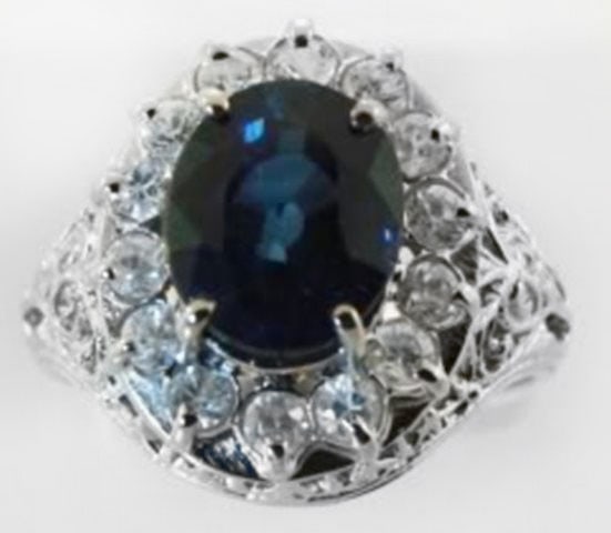 Blue Sapphire Diamond Ring 3.84Ct 14k W/g: Gem: Natural Sapphire and Diamond Diamond 14 Pieces.61 Carat Round Brilliant Clarity: SI2-Color: H-Treatment: None Center Sapphire 3.23 Carat Oval Facet Measurement:9.4 x 8mm Clarity: SI-Color: Midnig