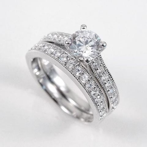Creation Diamond Ring 1.88 Carat 14k W/g Overlay: Creation Diamond High Quality Qty: 1 Total Weight 1.88 carat Center: 1.04 carat Round Brilliant ( Clarity: VVS, Color: F ) Small stone weight: .84 carat round shape (Clarity: VVS, Color: F) Metal: 18K