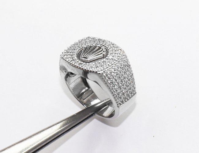 Man's Creation Diamond Ring 1.12 Ct 18k Overlay 925: Gem Type: Creation, Diamond Item: Man's Ring Size: 8 Stone: 1.12 carat round brilliant Clarity: VS1 Color: G Metal: 18k white gold overlay 925 Silver Weight: 8.84 Grams, Diameter: Face 20X17mm