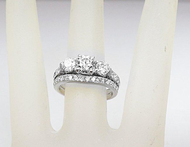 Present Past Future diamond Ring 2.58Ct 14k W/g: Gem Type: Natural Diamond Weight: 2.58 Carat Round Brilliant Center: .64 CT, Size: 5.6mm, Clarity: SI1, Color: G 2 diamond side by side: .46 CT 4.2mm, Clarity: SI1, Color: G Small 46 diamonds on the b