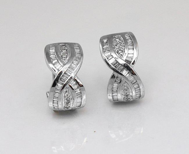 Stunning Diamond Earrings 1.38 Carat 14k W/g: Gem Type: Natural Diamond Item: Earrings Diamond: .14 Carat, 12 Pieces Round Brilliant Clarity: VS2, Color: G, Treatment: None Diamond: 1.24 Carat Baguette, Clarity: SI1, Color: Treatment: None Gold: 