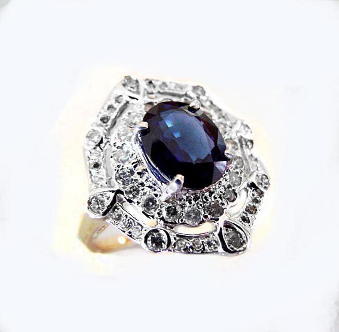 Ring Natural Blue Sapphire Diamond 4.33Ct 14k Y/g: Gem Type: Natural Blue Sapphire and Diamond 50 Pieces Diamond:1.42 carat round brilliant Clarity SI2,Color: H,Treatment:None Sapphire: 2.91 carat Oval shape Clarity:SI,Color: Midnight Blue Treatment: 