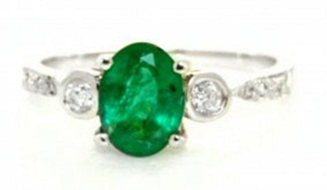 Anniversary Emerald Diamond Ring 1.49Ct 14k W/g: Gem Type: Natural Emerald & Diamond Qty: 1 Item Ring (Size: 6.5) Band thickness: 2-3mm Condition: New Diamond: 8 Pieces, Weight: .31 carat round brilliant Clarity: SI2, Color: H, Treatment: None