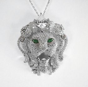 Creation Diamond Lion Pendant 5.70Ct 18k W/g Overlay: Creation Diamond & Green Garnet High Quality Item: Pendant Weight:2.00 Carat Pear Shape Weight:3.45 Carat Round brilliant Clarity: VVS, Color: F Green Garnet:.25 Carat Marquise Cut Clarity: VVS, Color