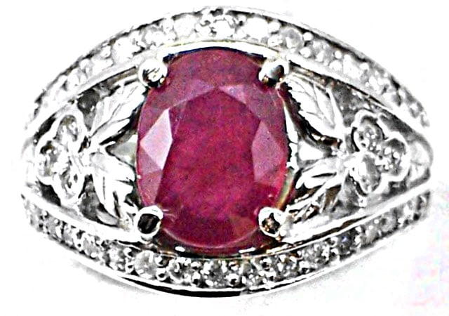 Anniversary Ruby Diamond Ring 4.06Ct 14k W/g: Gem: Natural Ruby and Diamond Diamond 38 Pieces 1.14 Carat Round Brilliant Clarity: SI2-Color: H-Treatment: None Center Ruby 2.92 carat Oval Facet Measurement: 9x7 mm Clarity: SI-Color: Red Pigpen Blo