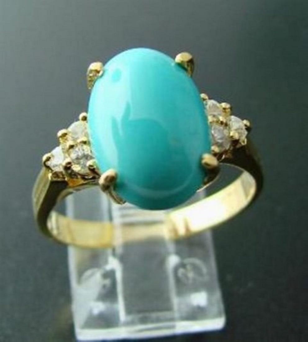 Turquoise Ring 3.39Ct & W/ Sapphire .24Ct 14k Y/G: Gem Type: Natural Turquoise/ Diamonds Qty: 1 Condition: New Item: Ring (Size: 7) Band thickness: 2-3mm Total diamond weight: .24 carat 6 pieces round brilliant Clarity: SI2, Color: H, Treatment: None 