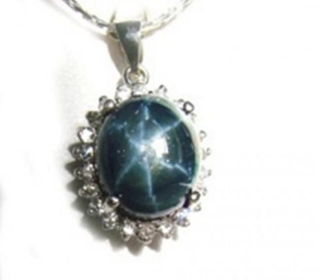 Star Sapphire Diamond Pendant:4.02Ct 14kW/g: Gem Type: Natural Star Sapphire and Diamond Condition: New Item: Necklace (Length: 16") Total diamond weight: .43 carat round brilliant Clarity: SI, Color: H, Treatment: None Cabochon Star Sapphire