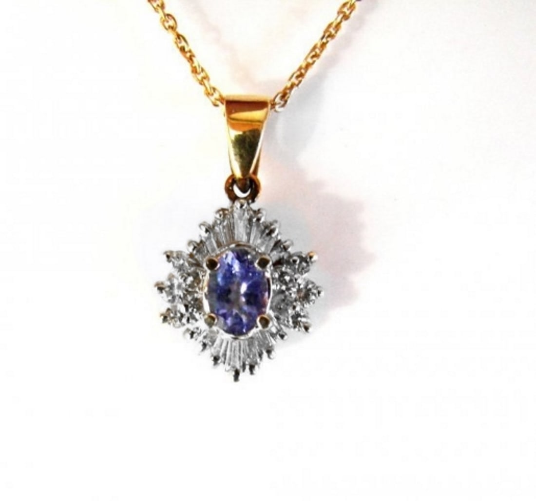 Natural Tanzanite Diamond Pendant: 1.89Ct14K Y/g: Gem Type: Natural Tanzanite and Diamond Pendant Diamond:10 Pieces,Weight:.30 Carat, Round Brilliant Diamond:14 Pieces Baguette,Weight:.42 Carat Clarity: SI1-Color: H-Treatment: None Tanzanite Weight:1
