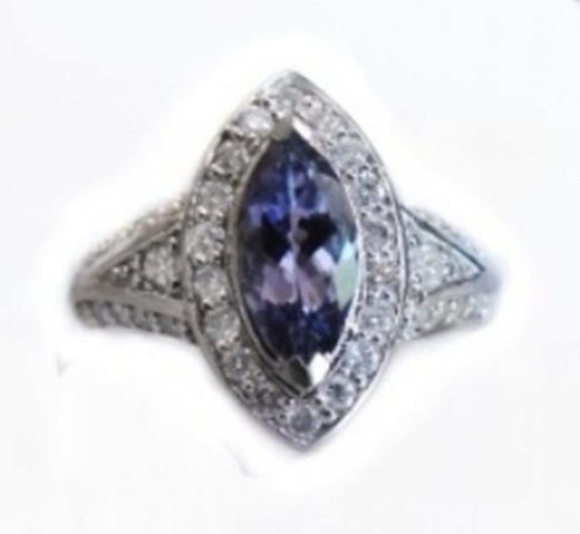 Tanzanite Ring 2.10CT Diamond:1.15 CT 14k W/G: Gem Type: Natural Tanzanite/Diamond Qty: 1 Condition: New Item: Ring (Size: 6.5) Band thickness: 3-4mm Total diamond weight: 1.15 carat round brilliant Clarity: SI1, Color: H-I Tanzanite total