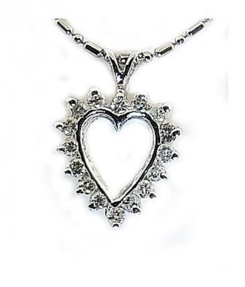 Heart Diamond Pendant .75Ct 14k White Gold: Stunning Heart Diamond Pendant 75carat genuine round brilliant cut Clarity: SI-I to I-1 Color: H-I 14k white gold and 1.9 grams Length: .70mm Width: .50mm Style: Antique Item: New Gender: