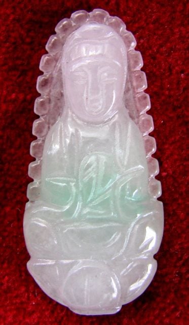 Guanyin Buddha Natural Chinese Jade Grade B: Handwork Jadeite Carving Guanyin Back Side Carving Smooth Grade: B Item Type:Pendant Origin: Beijing China (Mainland) Color:White and slightly Green Jade Weight:4.74 grams Size:H 35 x W 15 mm