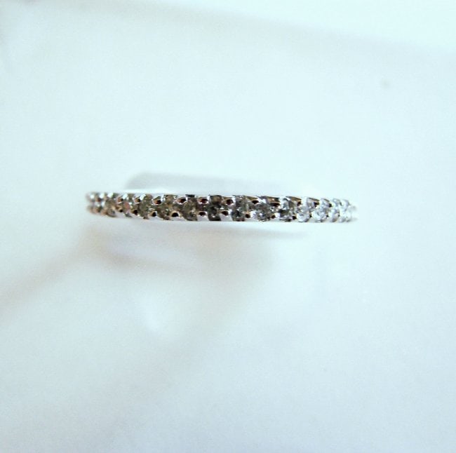 Wedding Ring Diamond .42Ct 14k W/g Size 7: Gem Type: Natural Diamond Item: Ring 33 Pieces Diamond: .42 Carat Round Brilliant Clarity: VS2,Color: G,Treatment: None Gold: 14k White gold and Weight 1.89 gram Size: 7,Condition: New Style: