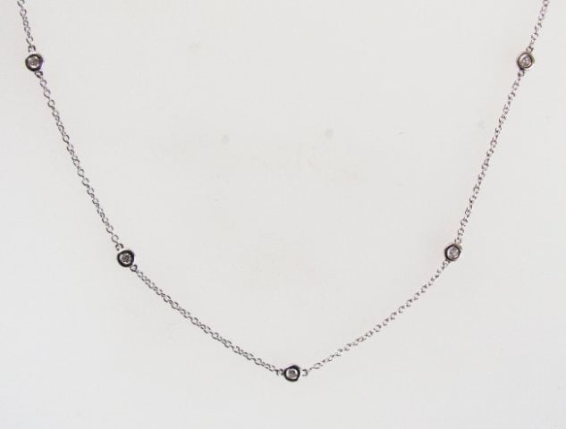 Creation, Diamond Pazel Chain .90Ct 18k W/g Over: Gem Type: Creation Diamonds High Quality 10 Pieces Round Brilliant Weight: .90 Carat Clarity: VVS,Color: F Metal: 18k White Gold Overlay 925 Silver Weight: 2.21 gram Chain: 17" Long Design: Pazel Sett