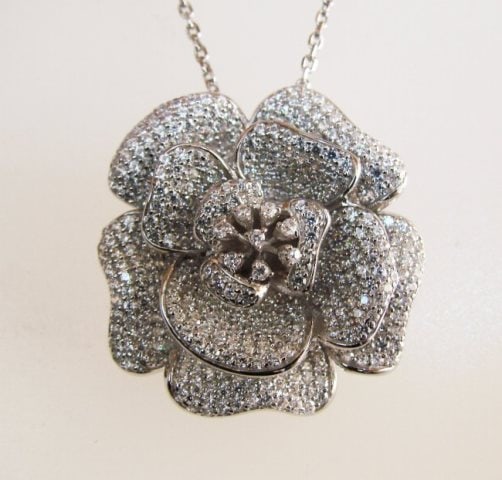 Creation Diamond Flower Pendant 3.87Ct 18k W/g Overlay: Gem Type: Creation Diamond High Quality Item Item: Earrings Weight: 3.87 carat, (Clarity: VVS, Color F) Setting : Micro Pave Metal: 18k White gold overlay 925 silver Weight: 12.22 grams, Come Whit Cha