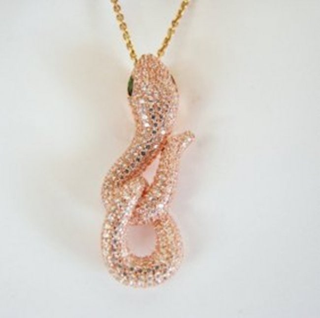 Creation Diamond Snake Pendant 3.28Ct 18k R/g Overlay: Creation Diamond & Green Garnet High Quality Item: Pendant Weight: 3.03 Carat Round Brilliant Clarity: VVS, Color: F Green Garnet:.25 Carat Marquise Cut Clarity: VVS, Color: Green Earrings Size: L 1.1