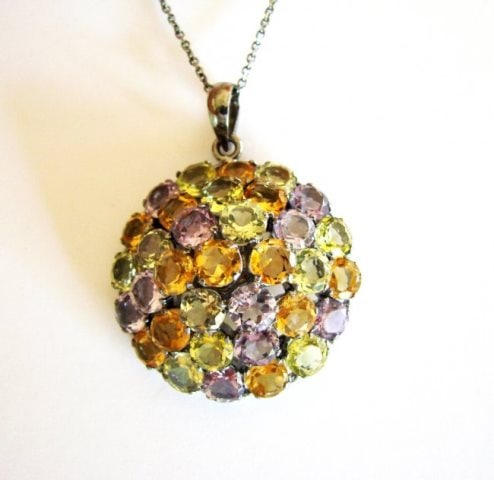 Multicolor Stone Pendant 44.20Ct 18k B/g Overlay: Gem: Natural Amethyst Citrine Lemon Topaz Item Pendant 34 Pieces Weight: 44.20 Carat Clarity: VS, Color: Multicolor Metal: 18k Black Gold Overlay 925 Silver Weight: 16.75 grams, Come With Chain 16" Ge