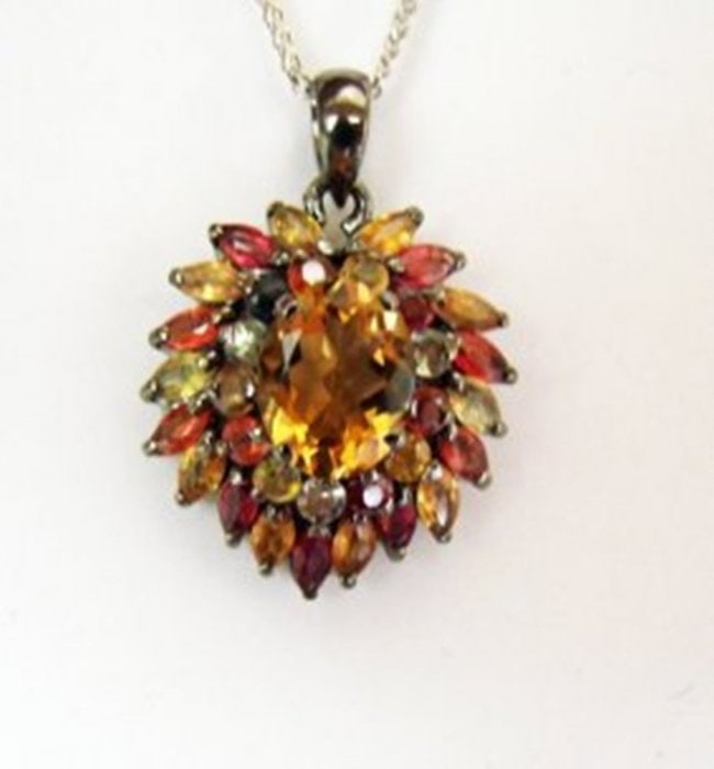 Natural Multicolor Pendant 7.55Ct 18k Ant Overlay: Gems Type: Natural Citrine, Multicolor Sapphire High Quality Item Hand made by Handicraft Item: Pendant Citrine center: 3.17 carat Oval Shape Measurement: 10x8 mm Clarity: VS,Color:Yellow Golden 62 pi