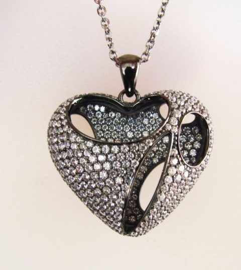 Creation Diamond Heart Pendant 2.40Ct 18k B/g Ovelay: Creation Diamond Heart Pendant High Quality item Item : Heart Pendants Stone : 2.40 Carat(Clarity: VVS, Color: D) Setting name: Micro Pave Setting Length: 1.1/4"H x 1.2/10" inch 18k Black gold Overlay