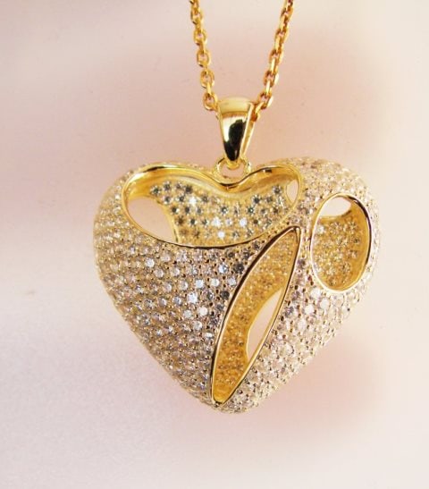 Creation Diamond Heart Pendant 2.40Ct 18k Y/g Overlay: Creation Diamond Heart Pendant High Quality item Item : Heart Pendants Stone : 2.40 Carat(Clarity: VVS, Color: D) Setting name: Micro Pave Setting Length: 1.1/4"H x 1.2/10" inch 18k Yellow gold Overla