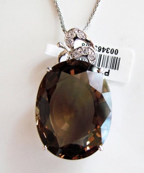 Smoky Topaz Pendant 22.57CT 28x22x14mm: Gem Type: Natural Smokey Topaz/Creation Diamond Quantity: 1 Smoky Topaz: Approx 22.57 Carat (Oval Shaped, Cut: Facet, Size: 28x22x14mm) Clarity: VS1, Color: Dark Brown, Treatment: None Hardness 7 Orig