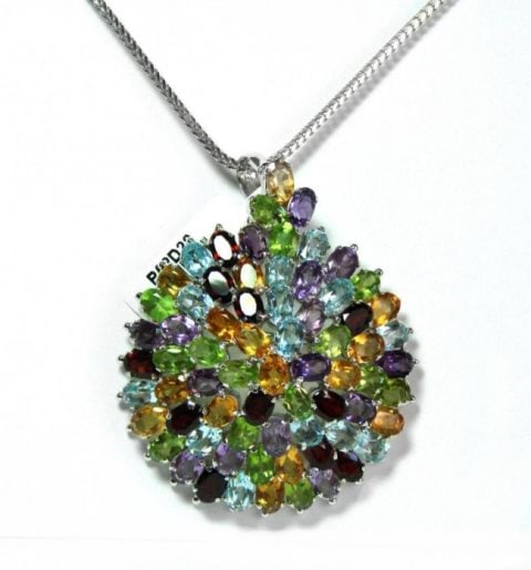 Multi-Colored Pendant 30.0018k W/g Overlay: Gems Type: Natural Garnet, Amethyst, Blue topaz, Peridot. Citrine High Quality Item Hand made by Handicraft Weight: 35.00 Carat (70 pieces, Size: 5x4mm ) Item: Pendant or Brooch Clarity:Transparent Co