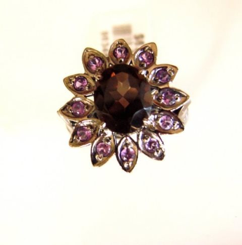 Smoky&Amethyst Ring 4.78Ct 18k B/g Overlay: Gem Type: Natural Smoky Topaz&Amethyst Ring Total Weight :4.78 Carat Oval Facet Clarity :VS ,Color: Brown,Treatment: None Measurement:10x8mm Origin: Brazil 12 Pieces,Size :3 mm Each Metal: 18k Black g