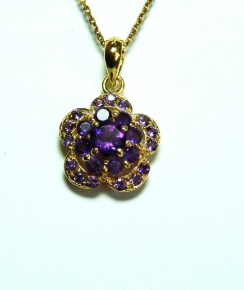 Natural Amethyst Pendant 1.98Ct 18k Y/g Overlay: Gems Type: Natural Amethyst Item: Pendant, 24 Pieces, Round Shape Weight:1.98 Carat Clarity: VVS, Color: Violet, Treatment: None Measurement:6x3.5x2.5mm Metal:18k Yellow Gold Overlay 925 Silver Weight