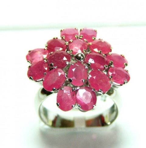 Natural Ruby Ring 8.64Ct18k W/g Overlay: Gems Type: Natural Ruby Item: Ring High Quality Item Hand made by Handicraft 9 Pieces Ruby Measurement:6x4 mm,Weight:8.10 Clarity: SI,Color: Pink Red,Treament:Fracture Filled Shape:Oval Facet Origin:M