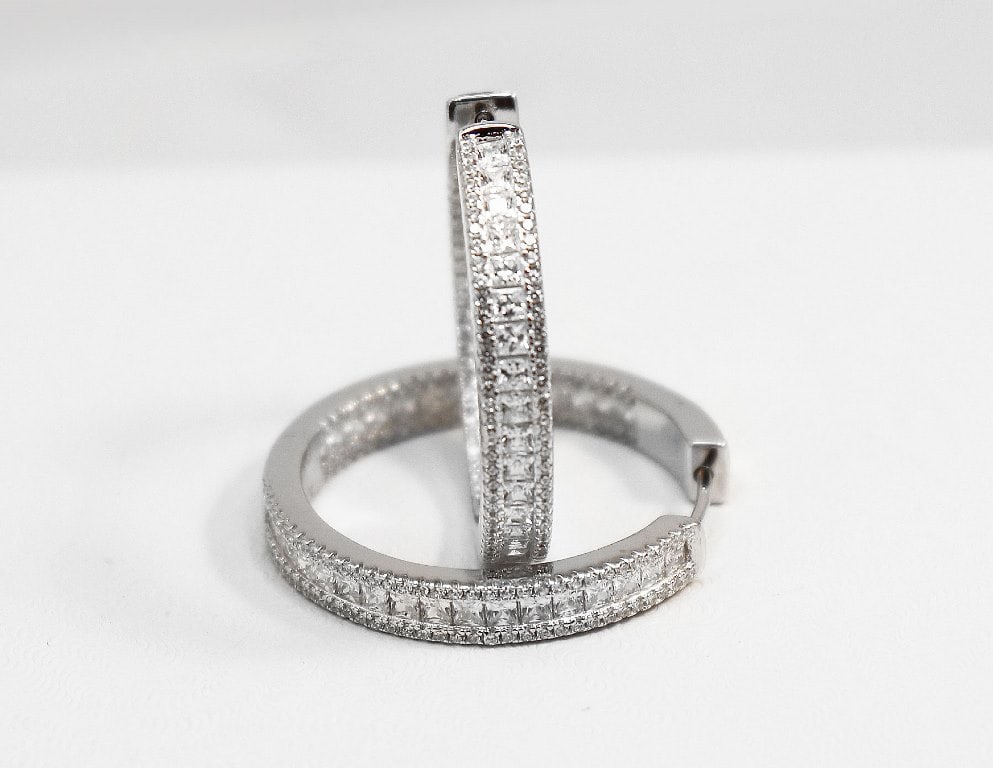 Creation Diamond Hoop Earrings 18k W/G Over: Gem Type: Creation Diamond/ Blue Topaz Item: Hoop Earrings, Size: 1.25 inches Diameter, Width: 4.5mm White Stone: 1.35 Carat round brilliant, Clarity: VS1, Color: G Princess Cut: 2.70 Carat, Clarity: 