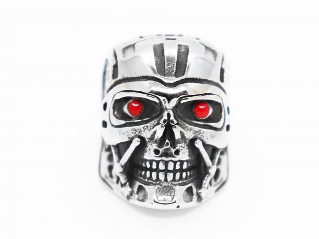 Man's Skull Stainless Steel Piant Red Eyes: Quality: 1 Shape/Cut: Round Facet Cut Size: 10 Weight: 24 grams Width Band: 10, Thickness: 2 mm Face Measurement: 28 mm X 20mm Design: Antique/Paint red on the eyes Condition: New Metal: Stainless