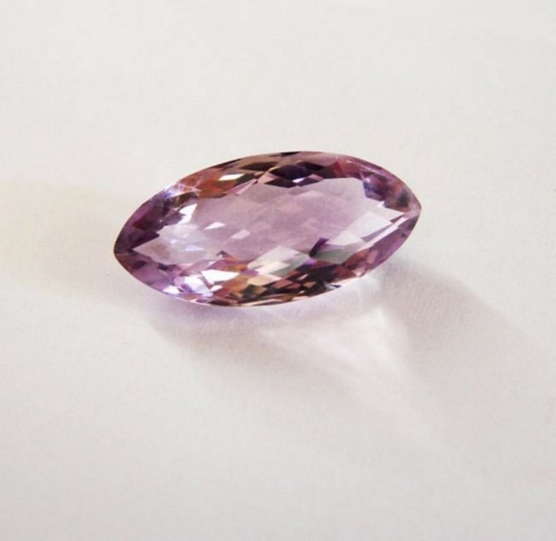 Natural Pink Amethyst Marquis Checkerboard 7.83Ct: Gem: Natural Pink Amethyst Qty: 1 Weight: 7.83 Carat Marquis Shape Cut: Checkerboard Measurement: 19.9x9.4x7.3 mm Clarity: VVS, Color: Pink Treatment: None Origin: Brazil Estimate Value Prices $485.