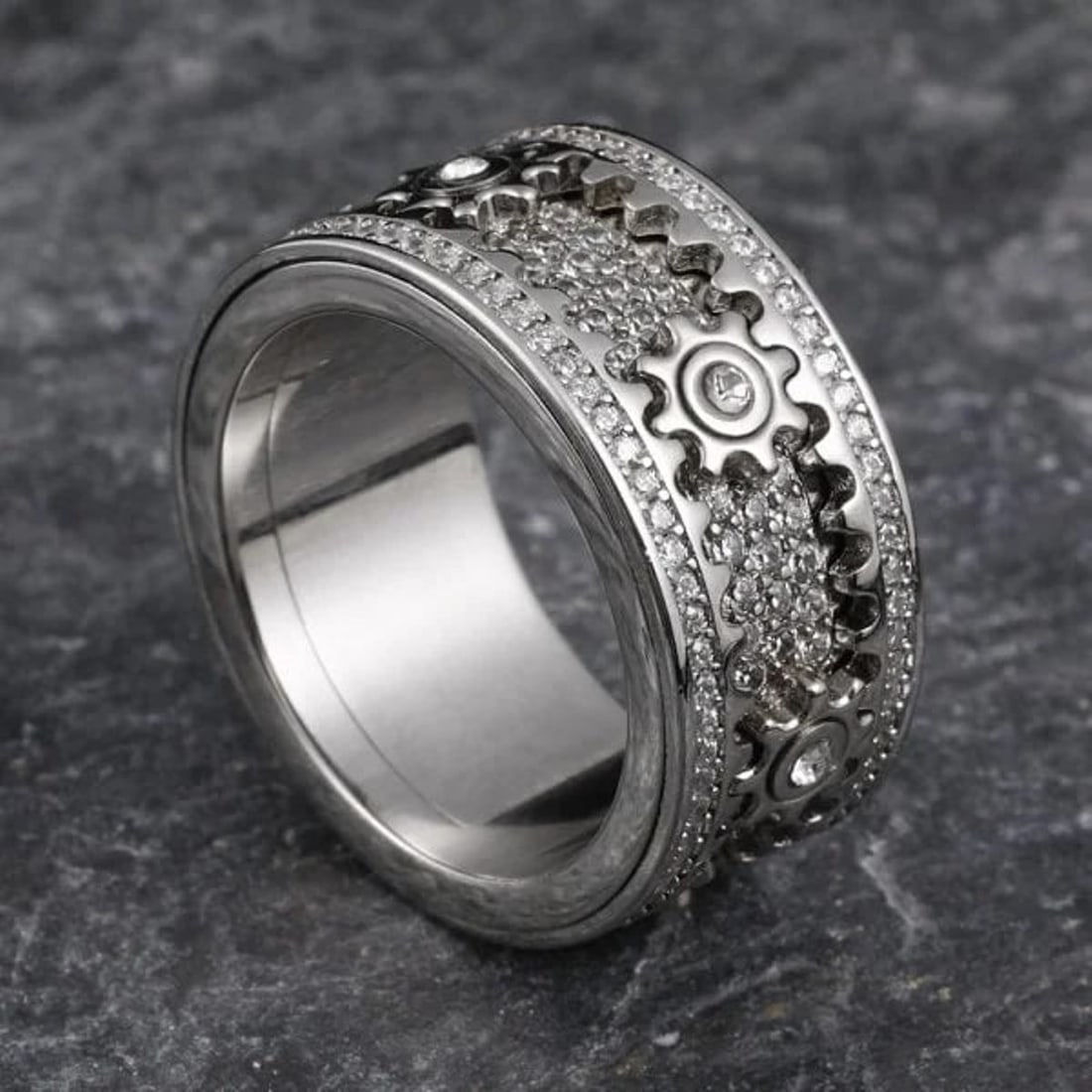 Creation, Diamond Gear Eternity Ring 1.15 Carat W/G Overlay 925: Gem: Creation, Diamond Stone: 1.15 carat white brilliant round shaped Clarity: VVS1 Color: F Metal: 14k White gold overlay of 925, 11.63 grams Size: 7 Width: 11 mm Thickness: 2mm Style: Gear Rin