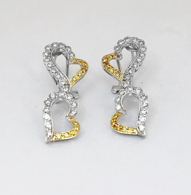 Heart Shape Dangle Earring Diamond 1.00Ct 18k W/g: Gem Type: White /Yellow Diamond Yellow Diamond: 20 pieces .40 Carat round brilliant, Clarity: SI1, Color: Yellow Fancy White Diamond: 44 pieces 1.10 Carat round brilliant, Clarity: SI1, Color: H