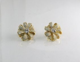 Creation Diamond Earrings 3.75Ct 18k Y/G Overlay: Gem Type: Creation, White Diamond Quantity: 1 Pairs Weight: 3.75 carat Round brilliant Clarity: VSI, Color: F Face: 30mm Setting: Micro Pave 18k yellow gold overlay 925 silver Weight: 14.40 grams <