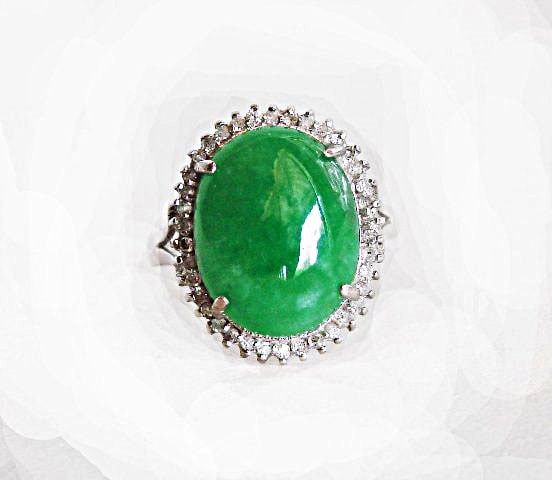 Anniversary Ring Jade Diamond 8.75Ct 14k W/g: Gem Type: Natural Chinese Jade and Diamond Item: Ring (Size: 7) Diamond: .61 Carat Round Brilliant Clarity: I, Color: H-I Jade : 8.14 Carat Oval Cabochon Grade : A, Color: Emerald Green Measurement: 1