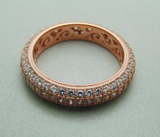 Creation Diamond Ring 2.00Ct 18k Rose Gold Over: Gem Type: Creation Diamonds 2.00Carat (VVS-Color-F) Item: Eternity Ring Quantity: 1 Setting name: Micro Pave 18k rose gold rhodium overlay of pure 925 silver 925 silver weight: 3.70 grams Color: Rose 